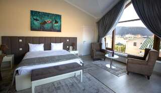 Отель AlmaBagi Hotel&Villas Губа Номер с кроватью размера «king-size» и видом на горы-3